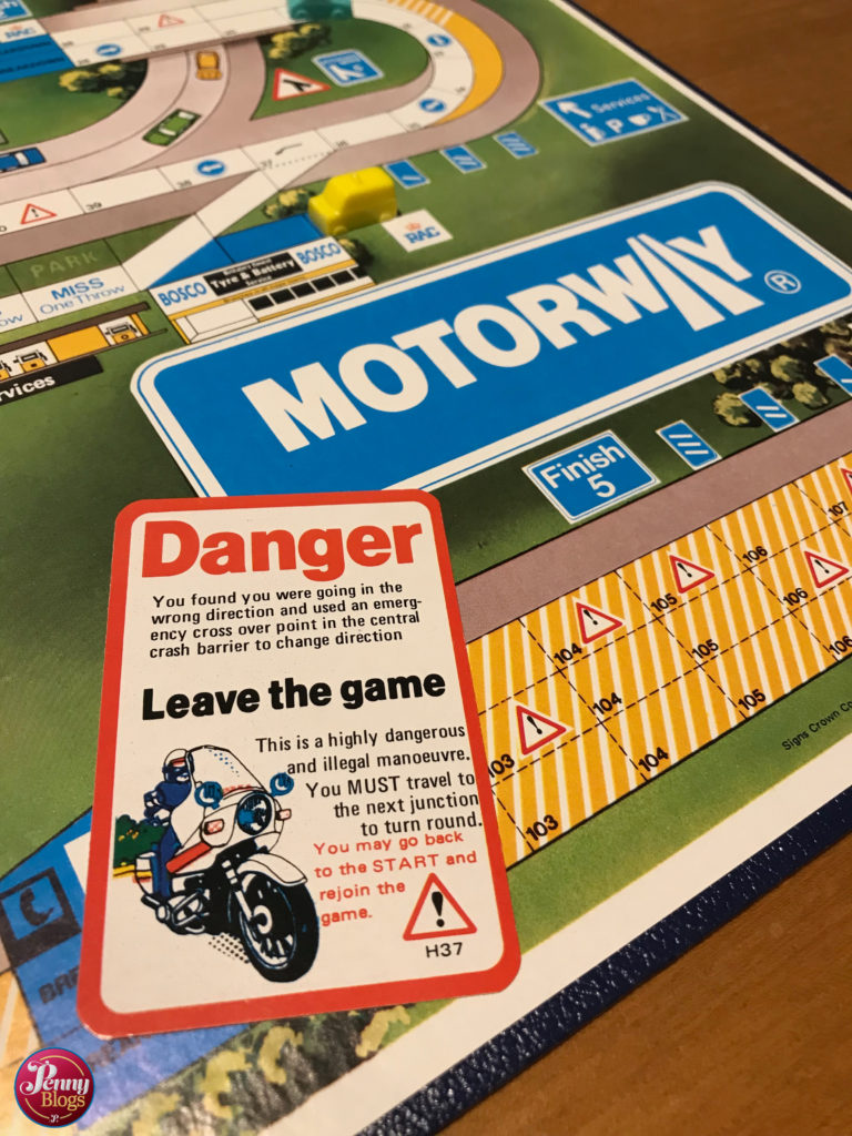 Leave the game card in the Motorway board game