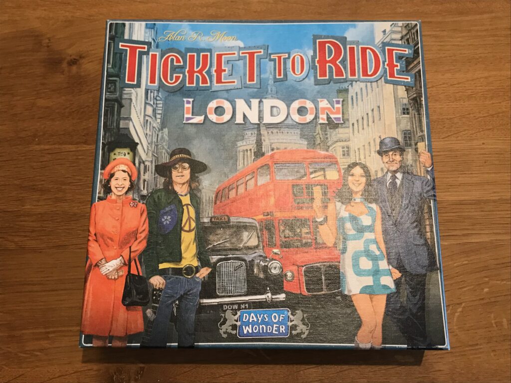 The Ticket to Ride London box showing an iconic London red bus and four London characters.